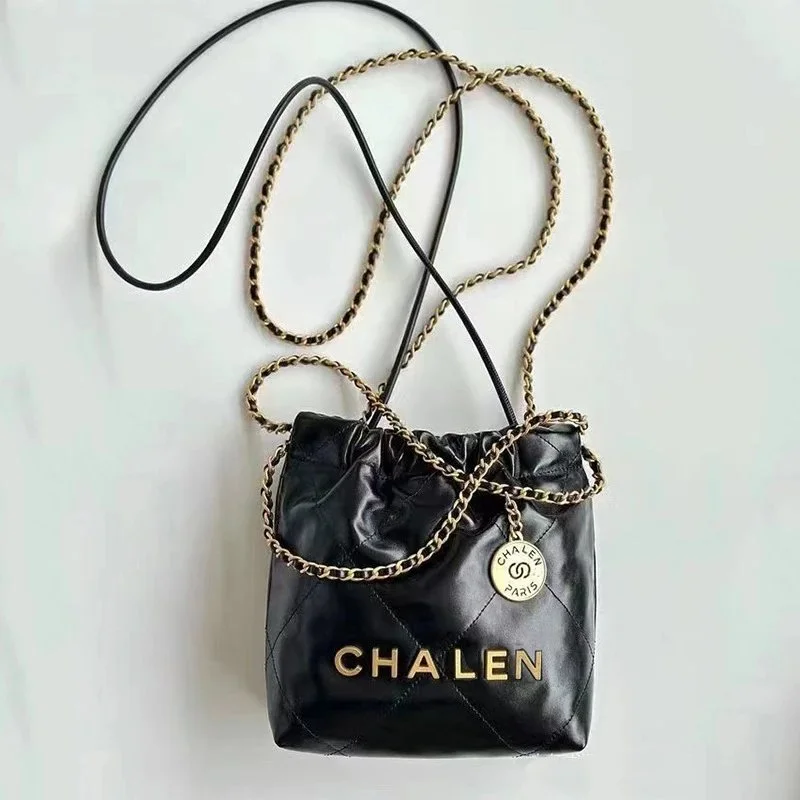 Chanel Black Gold Mini Pouch Bag